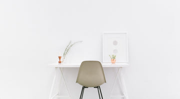 Clean white desk for work from home set up.