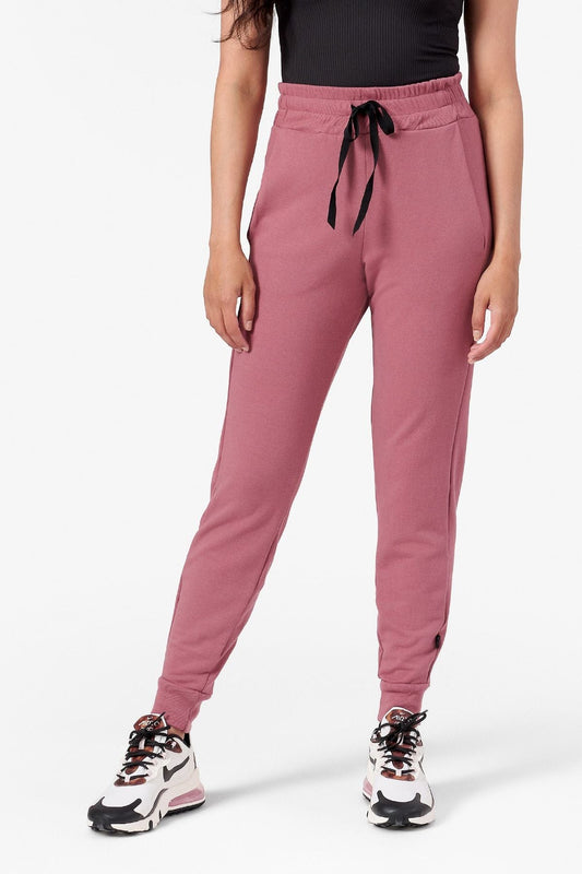 Woman wearing pink joggers