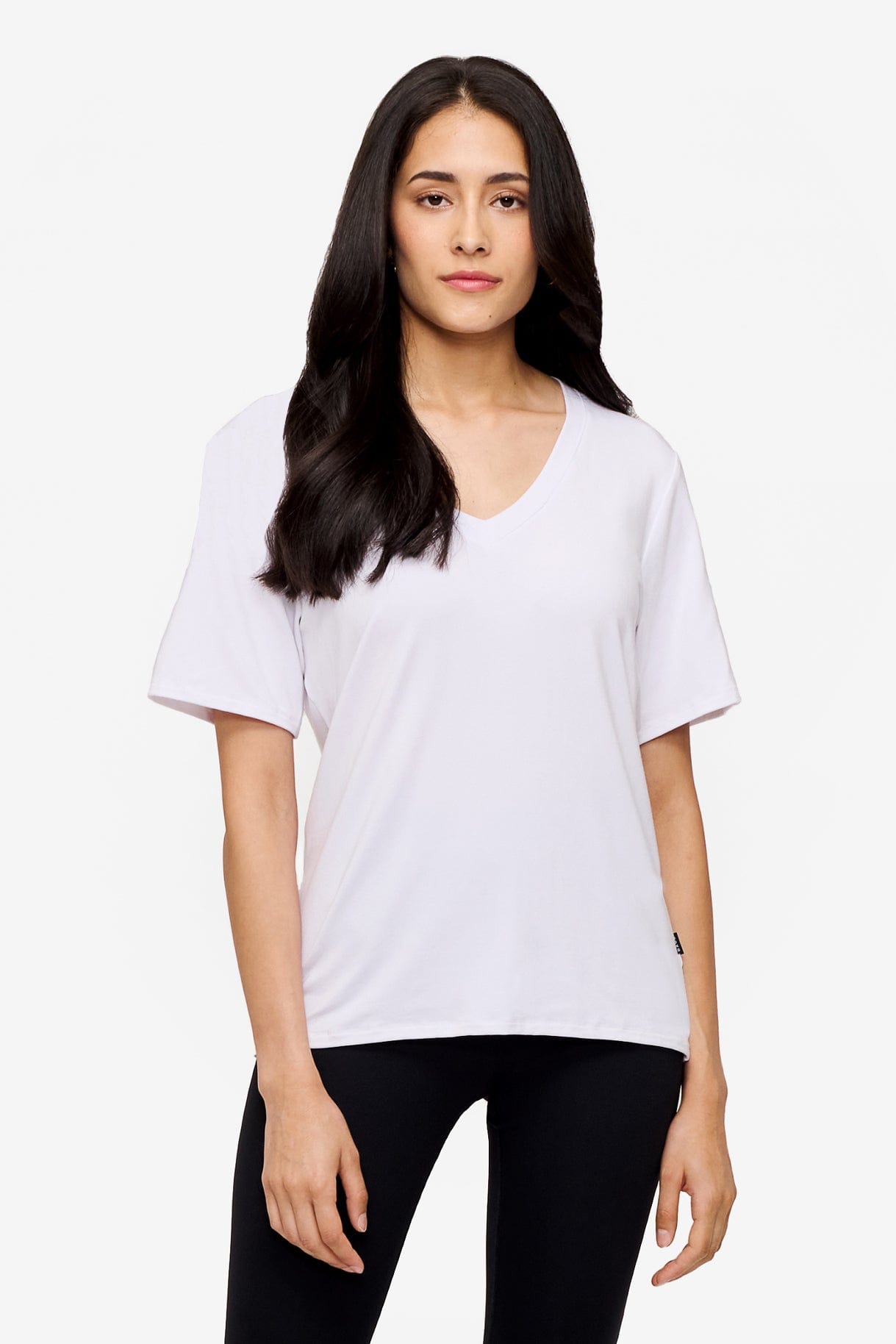 woman wearing white v-neck short sleeve t-shirt