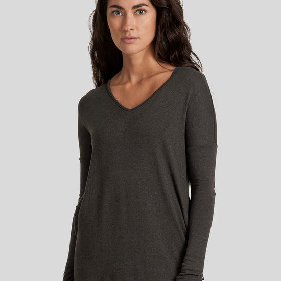 Women wearing an The Ivy Marie Tunic and black leggings.