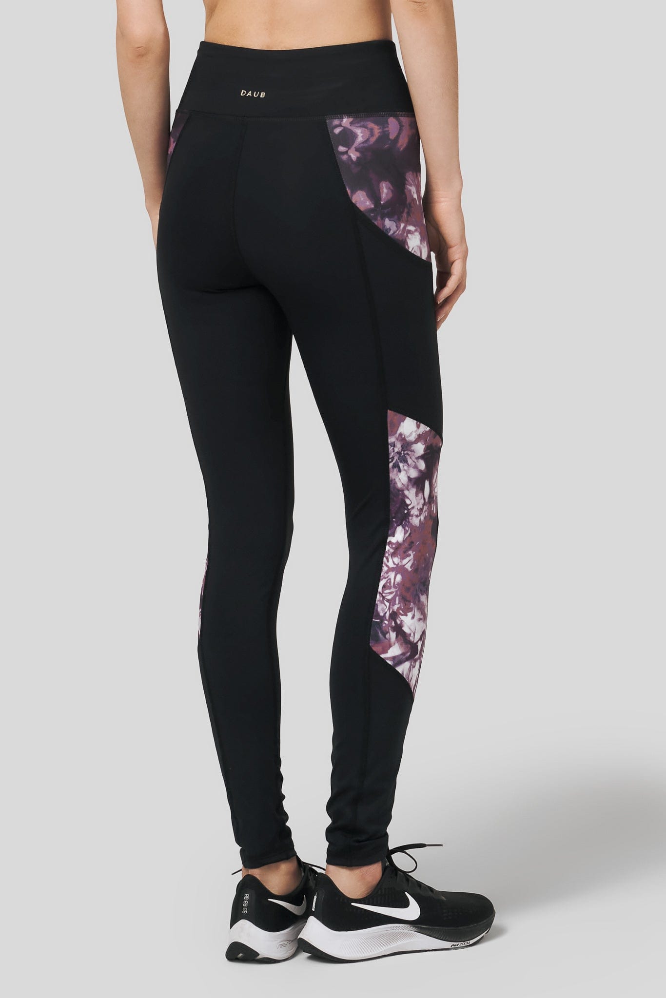 DAUB's Pocket Legging has a burgundy tie dye side panel and pocket!