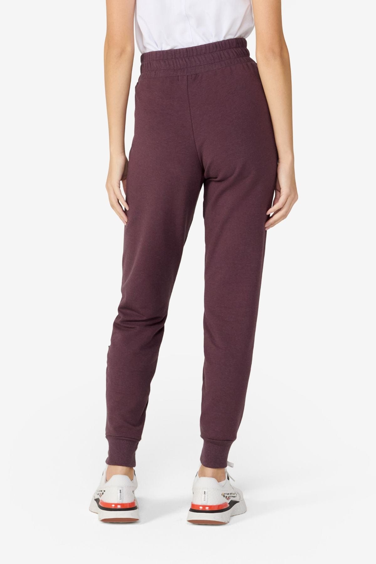 girl at her back view wearing dark brown jogger