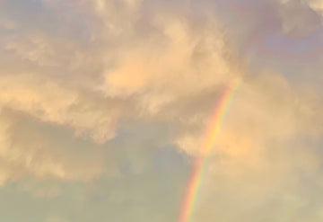 Rainbow and clouds aesthetic photo for gratitude, reflection and inspirational quotes.