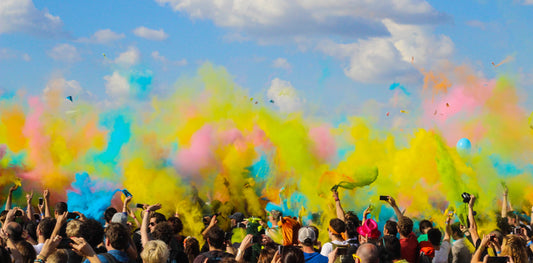 Music festival colourful smoke over crowd