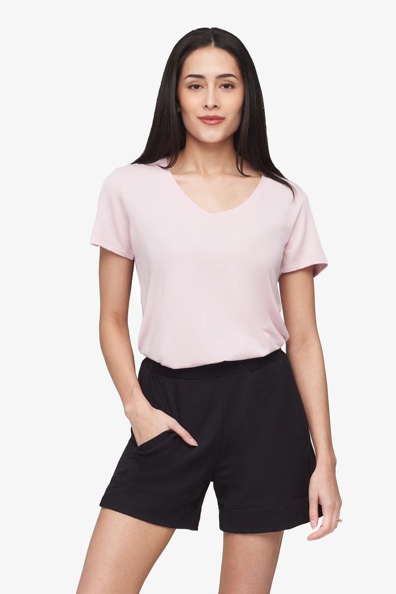 Avery Tee - Women's Basic T-Shirt in Rose Quartz pink - front tucked into black shorts | Daub + Design