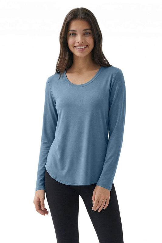 Woman wearing a blue long-sleeve shirt on a white background