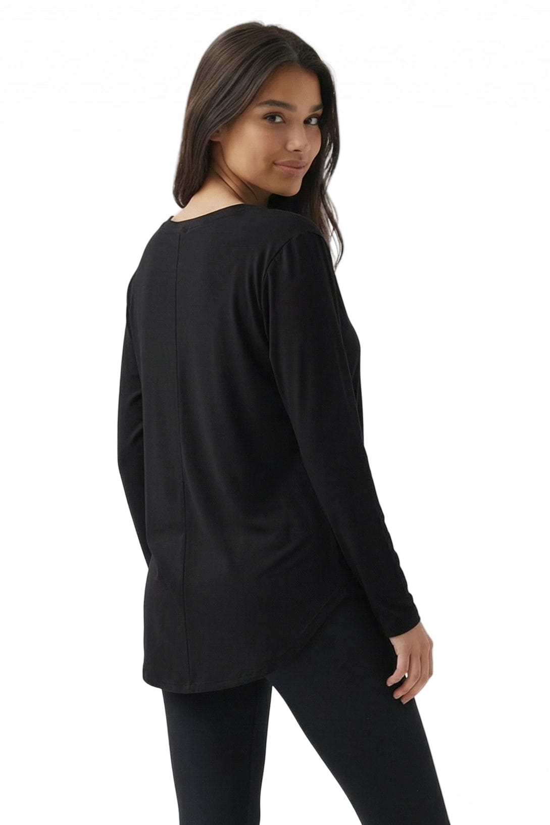 Woman wearing a black long-sleeve top on a white background
