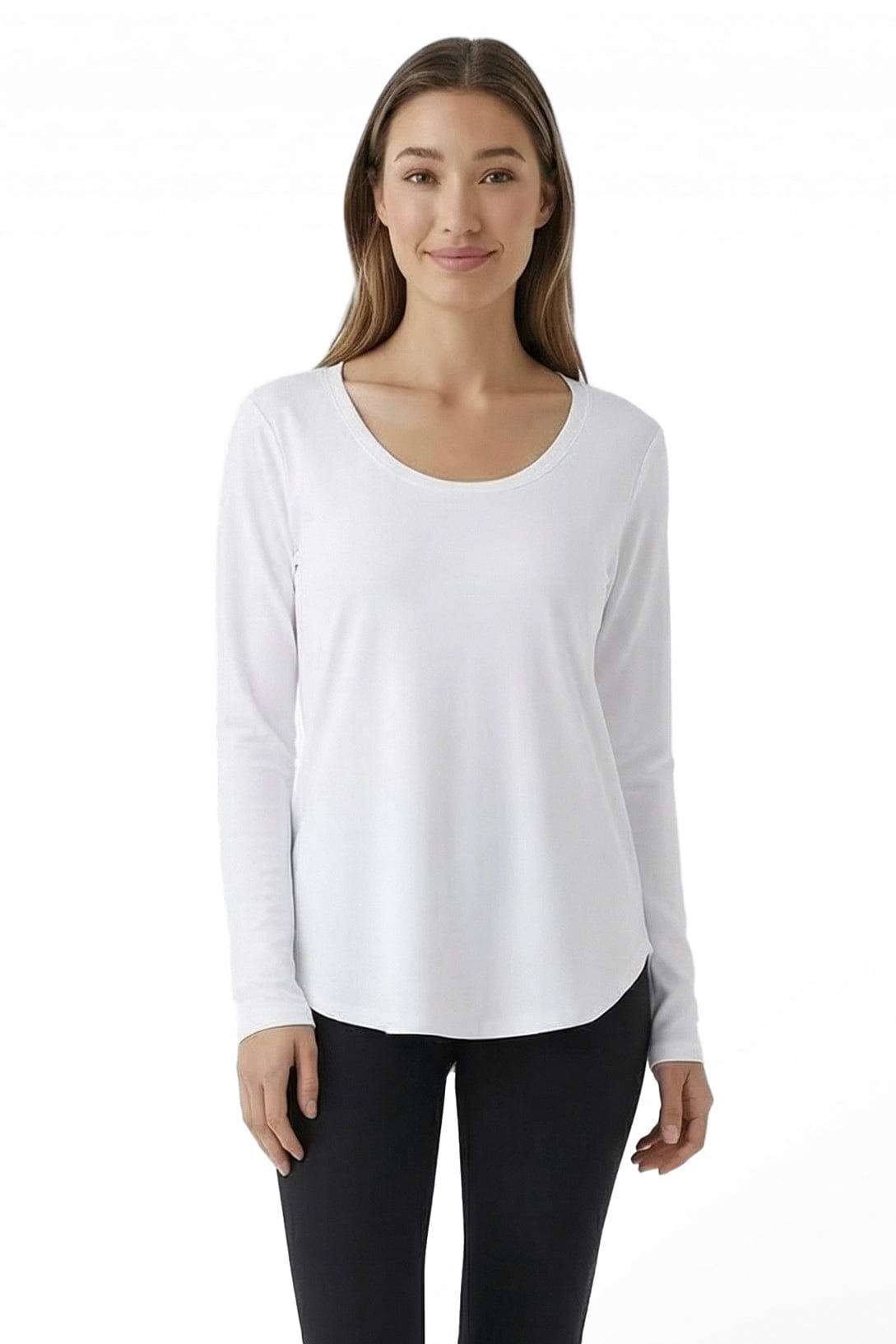 Woman wearing a white long-sleeve top and black pants on a white background