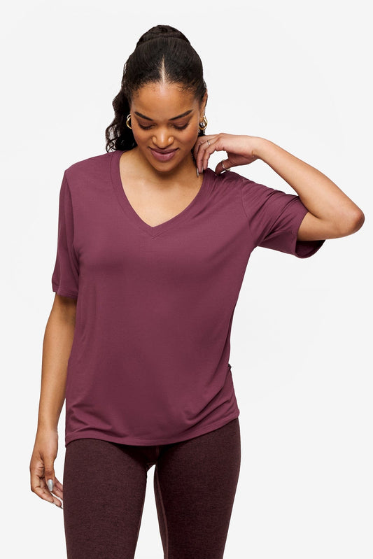 woman wearing deep pink v-neck short sleeve t-shirt