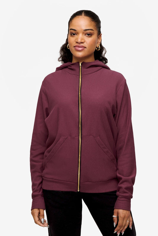 woman wearing full zip hoodie in deep pink