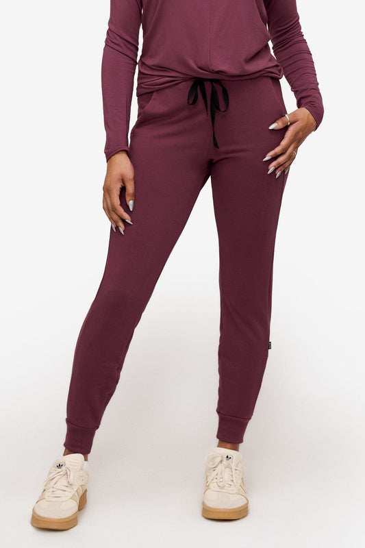 woman wearing deep pink sweatpants with drawstring 