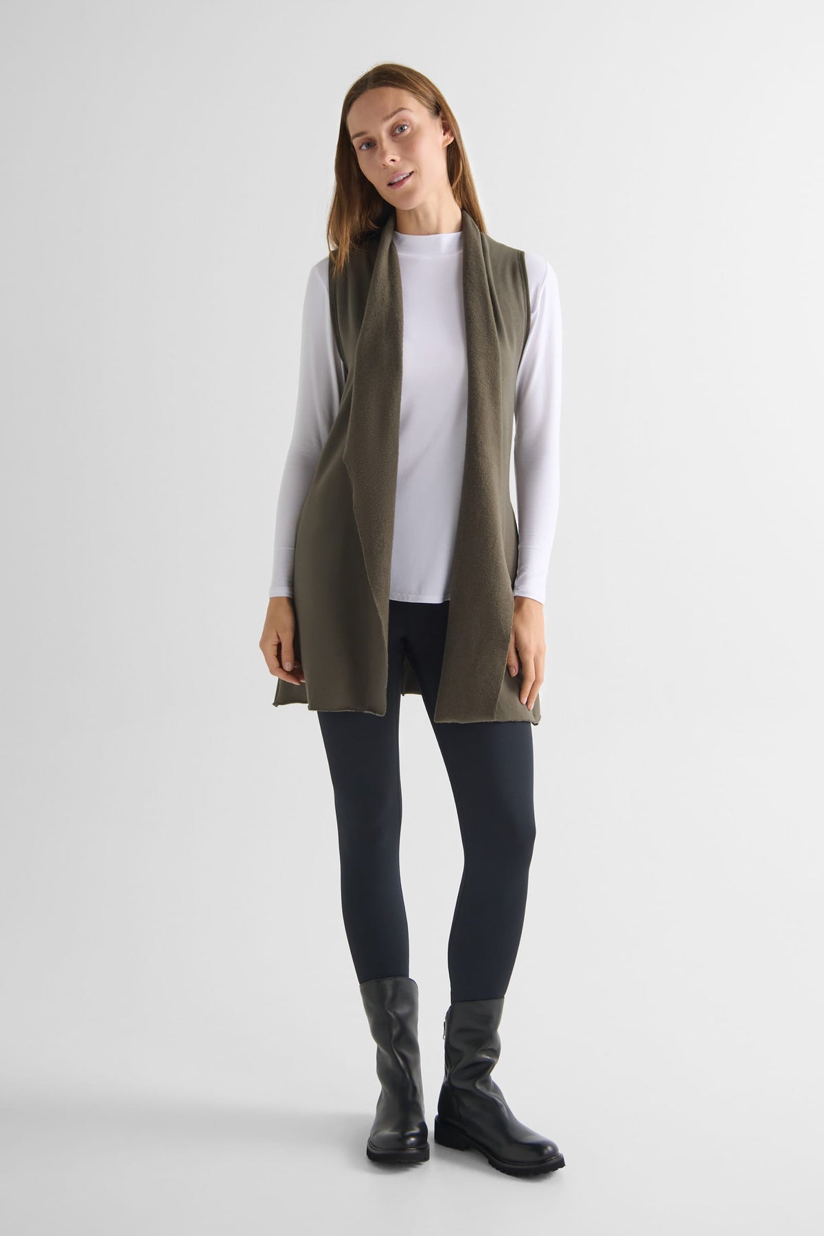 Hatley Vest in Spruce with Jensen Longsleeve in White and Riley Legging in Matte Black - Lightweight Women’s Fleece Vest in Spruce Green, Women's Basic Long Sleeve Top in White and Women's Basic Legging in Black | DAUB