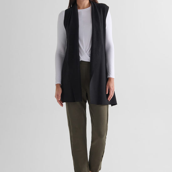 Hatley Vest in Black with Leilani Longsleeve in White  and Wren Pant in Spruce - Lightweight Women’s Fleece Vest in Black, Women's Basic Long Sleeve Top in White and Women's Straight Leg Pant in Spruce Green | DAUB