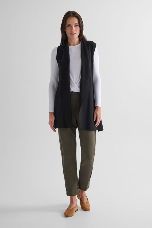 Hatley Vest in Black with Leilani Longsleeve in White  and Wren Pant in Spruce - Lightweight Women’s Fleece Vest in Black, Women's Basic Long Sleeve Top in White and Women's Straight Leg Pant in Spruce Green | DAUB