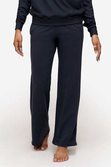 woman wearing deep blue wide leg sweatpants 