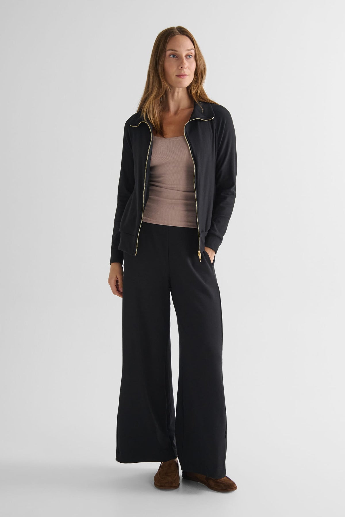 Freedom Full Zip Sweatshirt in Black with Basic Tank in Etherea and Starboard Pant in Black - Women's Full Zip Fleece Sweatshirt in Black, Women's Basic Tank Top in Beige and Women's Wide Leg Pant in Black | DAUB