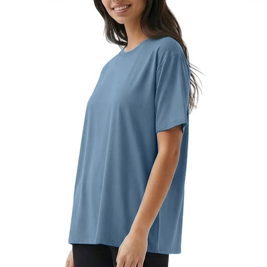 Woman wearing a blue t-shirt on a white background