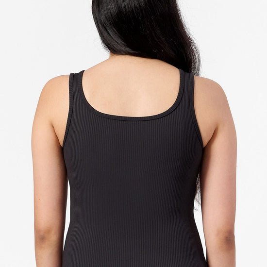 square neck tank top made from ribbed material worn by a woman