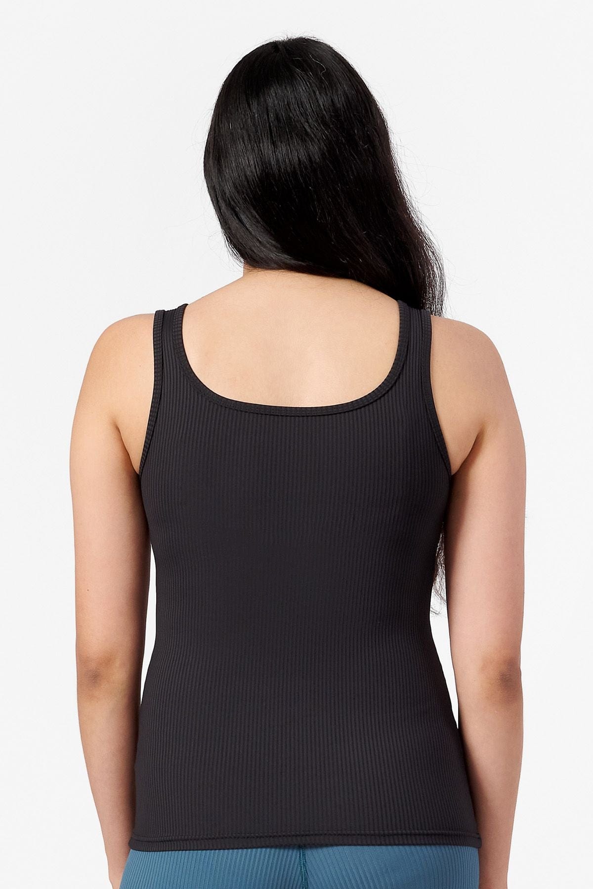 square neck tank top made from ribbed material worn by a woman