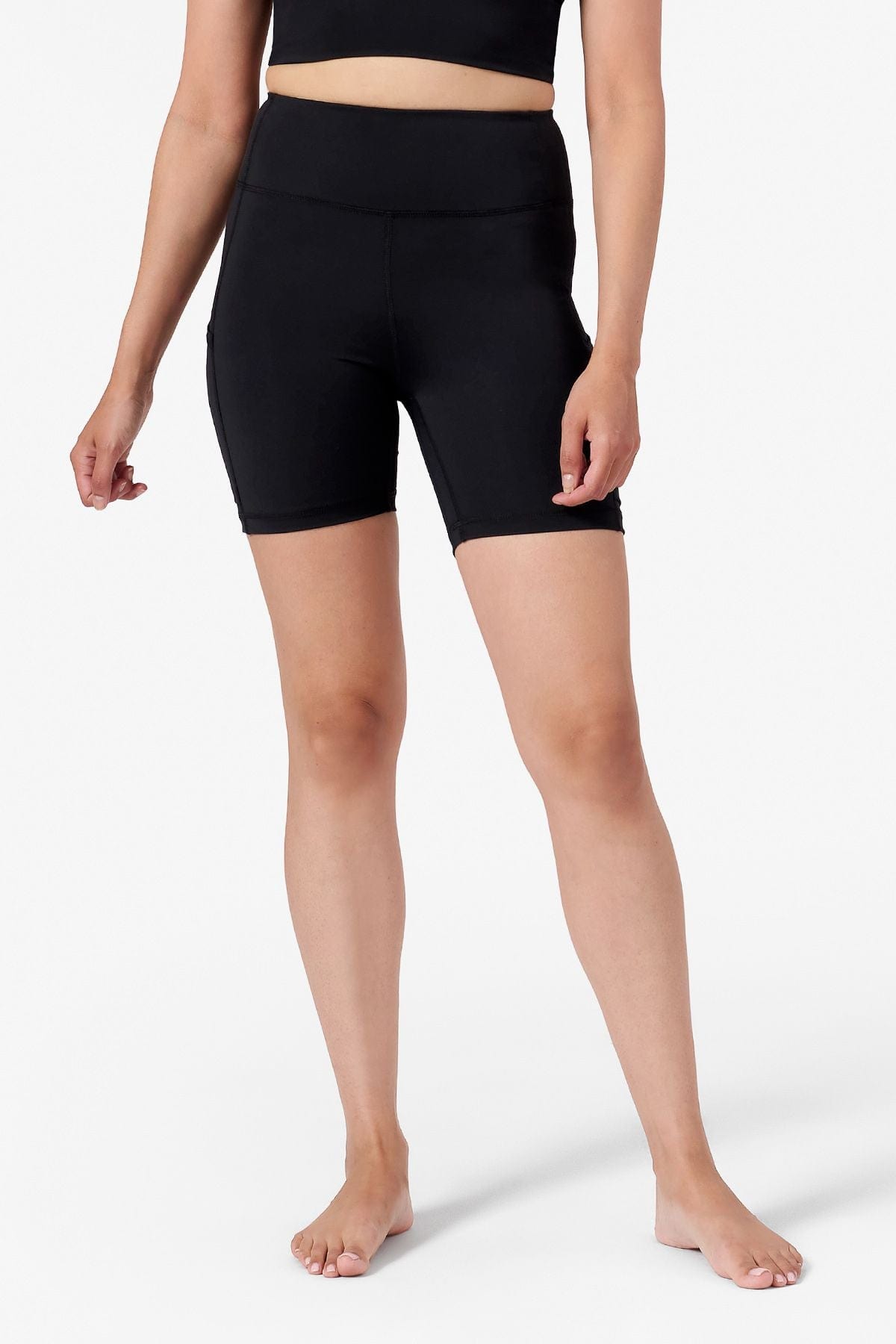 a women wearing black bike shorts with side pockets