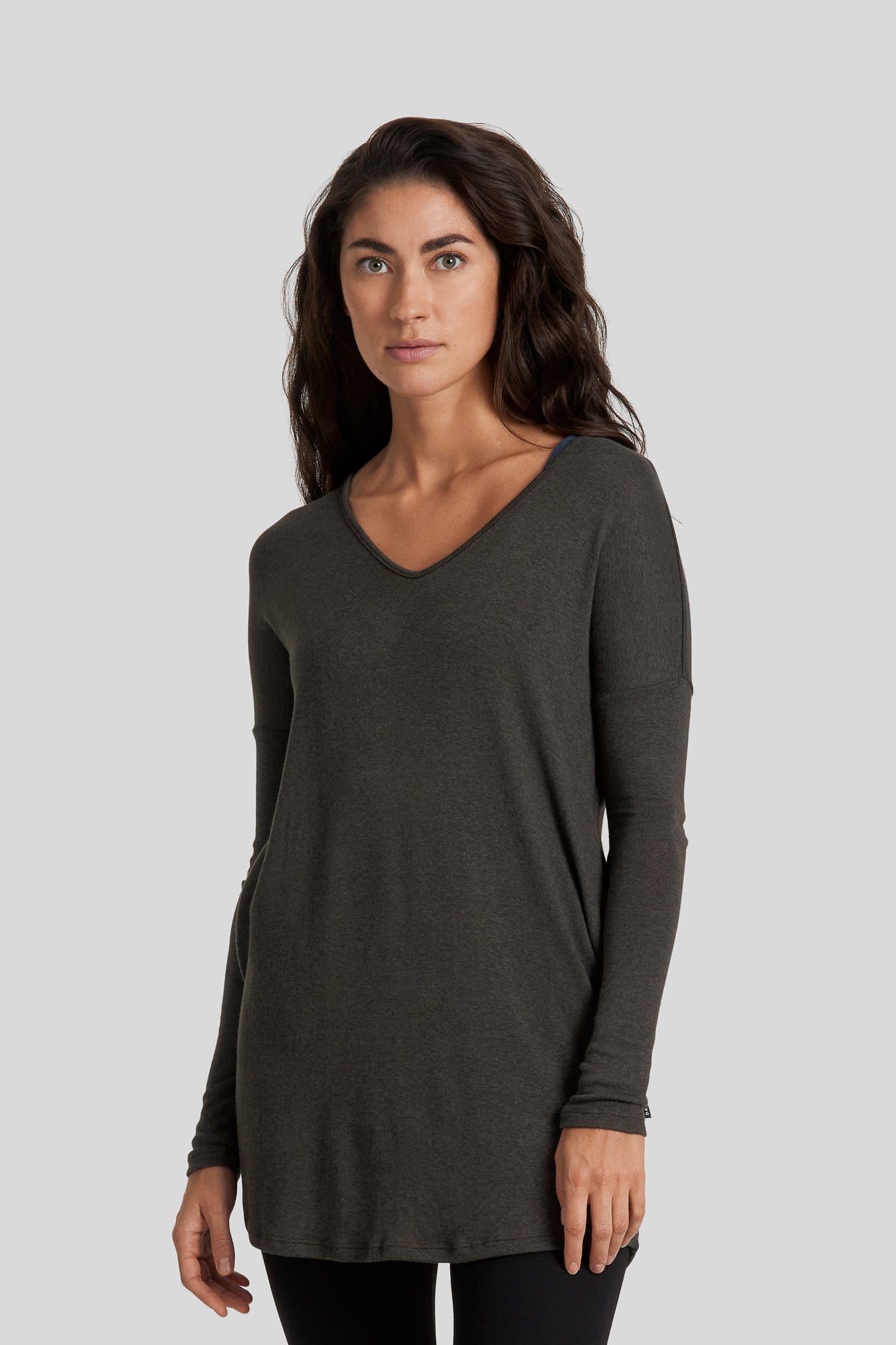 Women wearing an The Ivy Marie Tunic and black leggings.