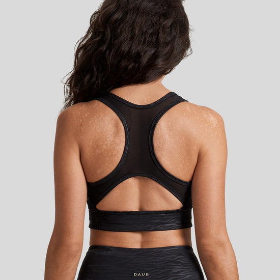 The back of the Savannah Crop in Zebra is shown with its mesh key hole detail
