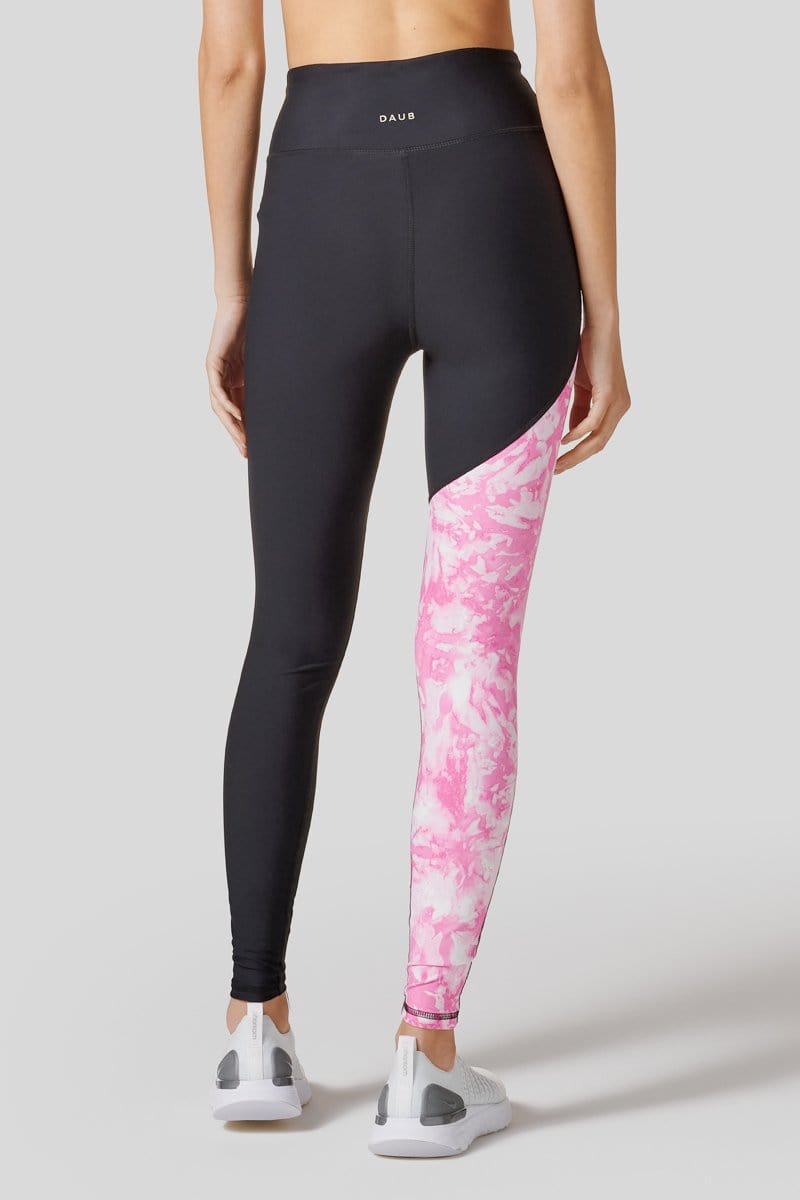Signature Leggings shown from the back. One leg is black and one leggings tie-dyed pink